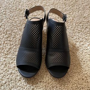 Restricted brand black open toe/back shoes